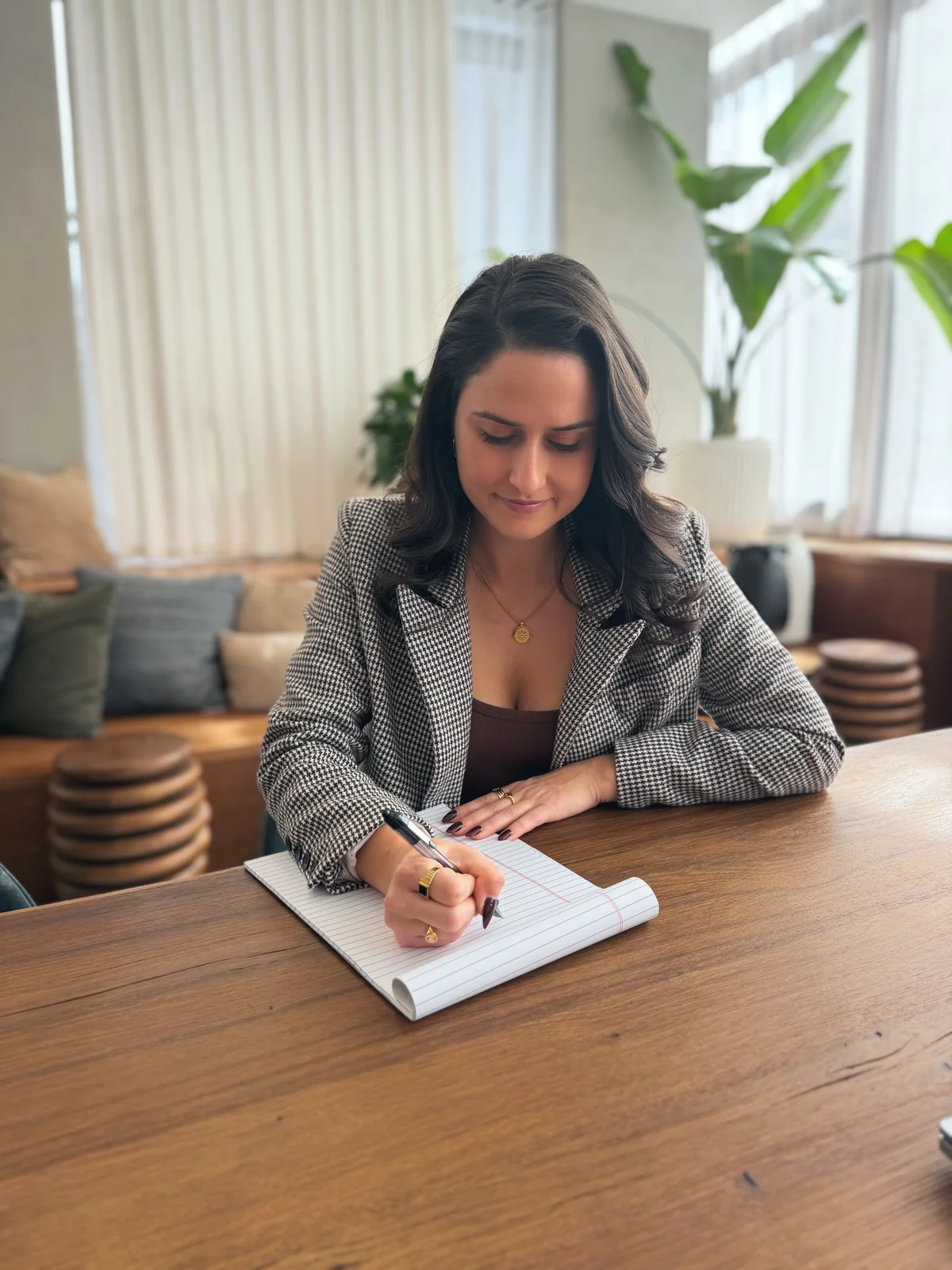 Christine writing in notebook